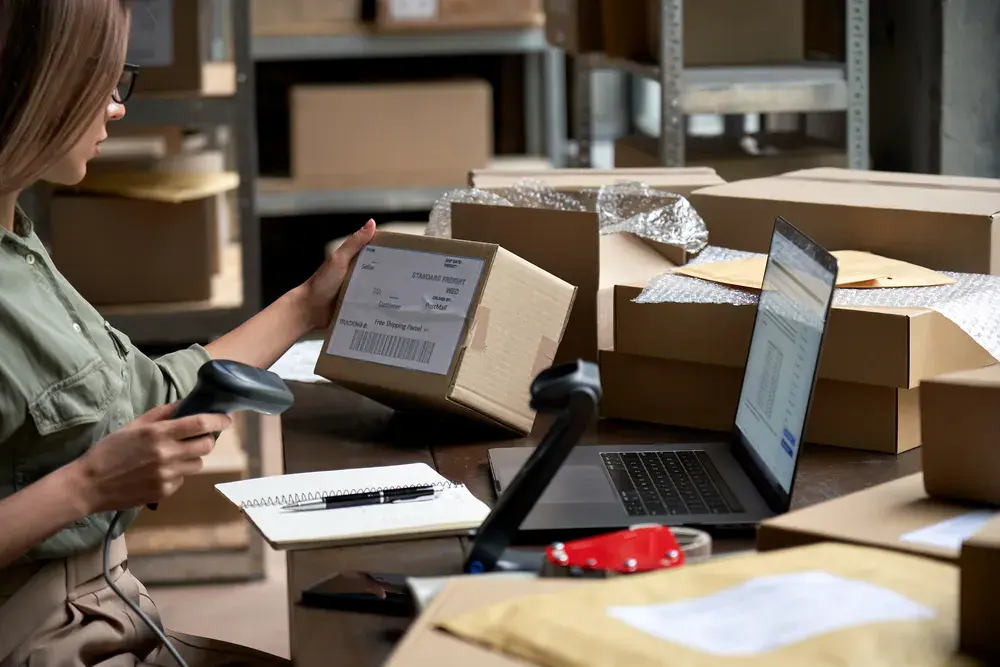 Online store owner managing e-commerce inventory efficiently with the help of self storage units